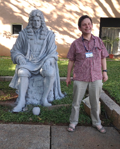me with statue of
Newton